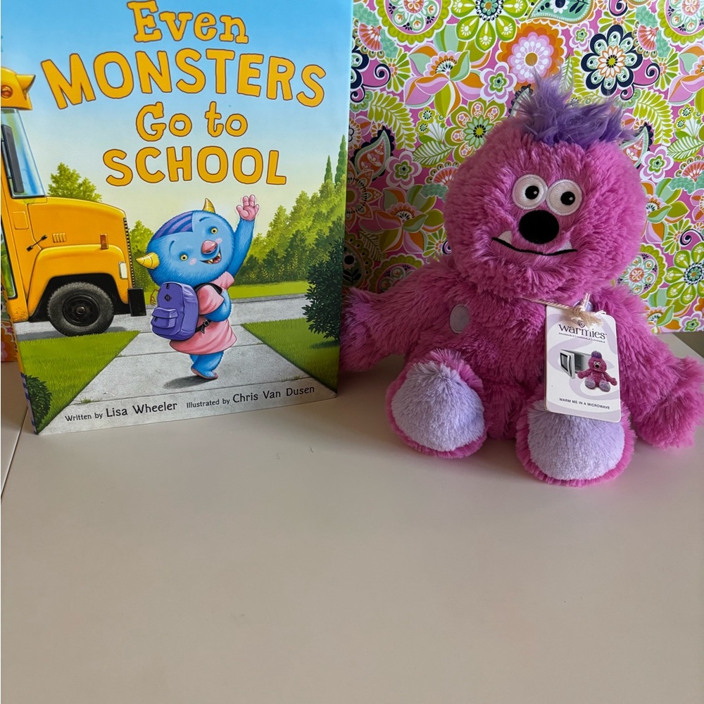 Purple Monster Warmie plush with matching monster book.